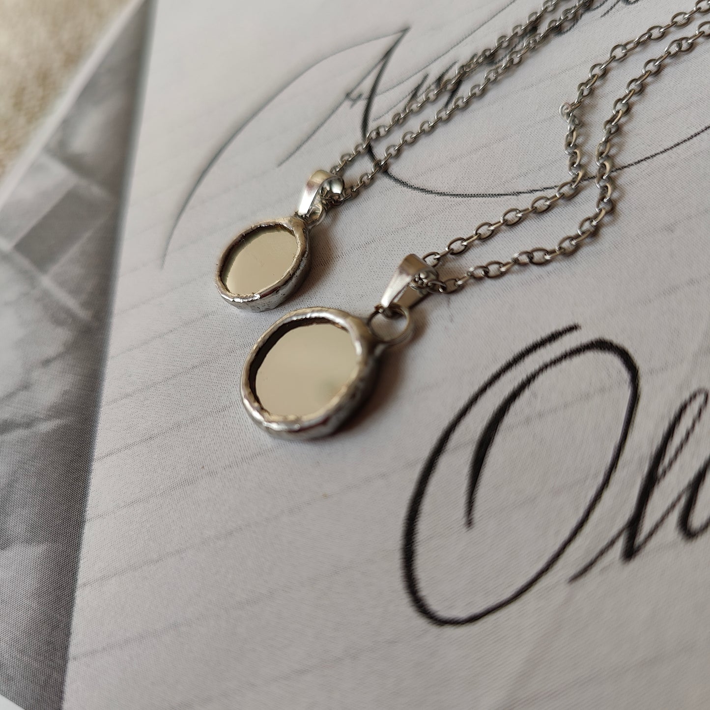 Double sided small mirror necklace