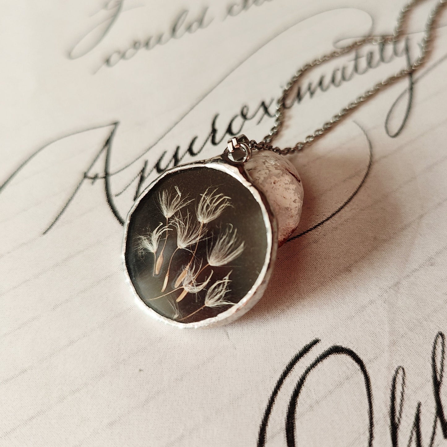 Double-sided mirror and dandelion pendant